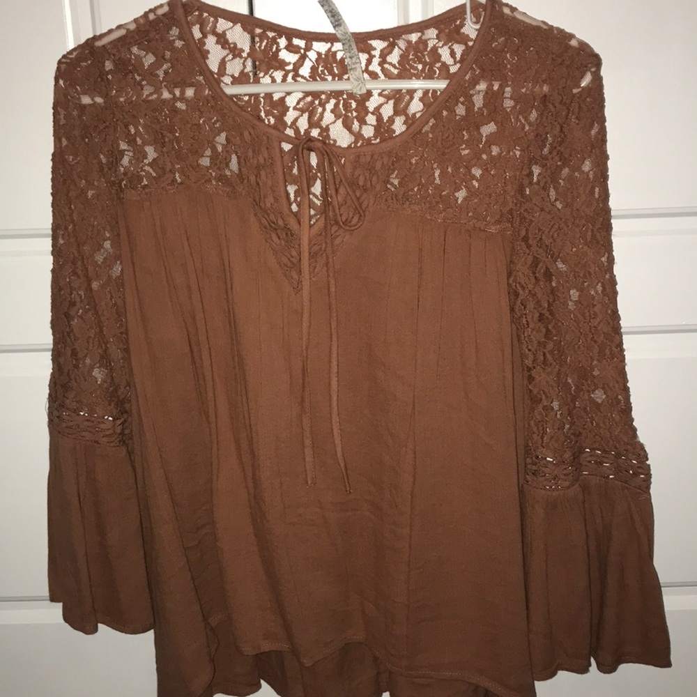 Size medium cute orangish pinkish blouse